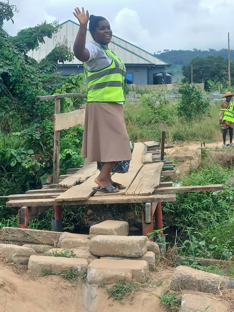 NECS field enumerator navigating municipal terrain